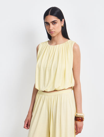 Koa Puff Ball Hem Top In Lemon