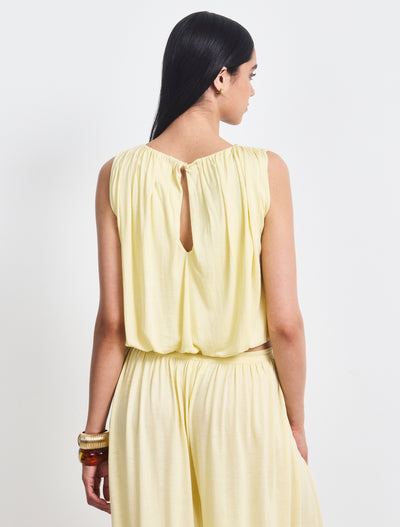 Koa Puff Ball Hem Top In Lemon